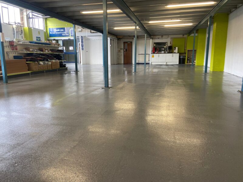 Grey epoxy flooring in industrial setting