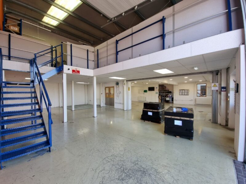 Grey epoxy flooring with blue stairs